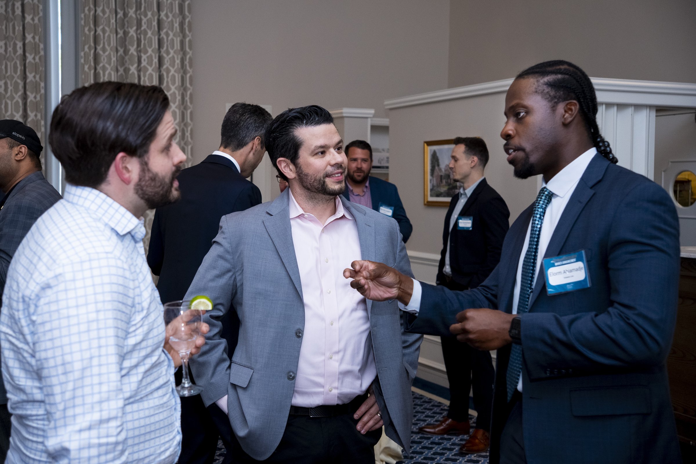Entrepreneurs and partners in conversation at a Pete du Pont Freedom Foundation E3 event